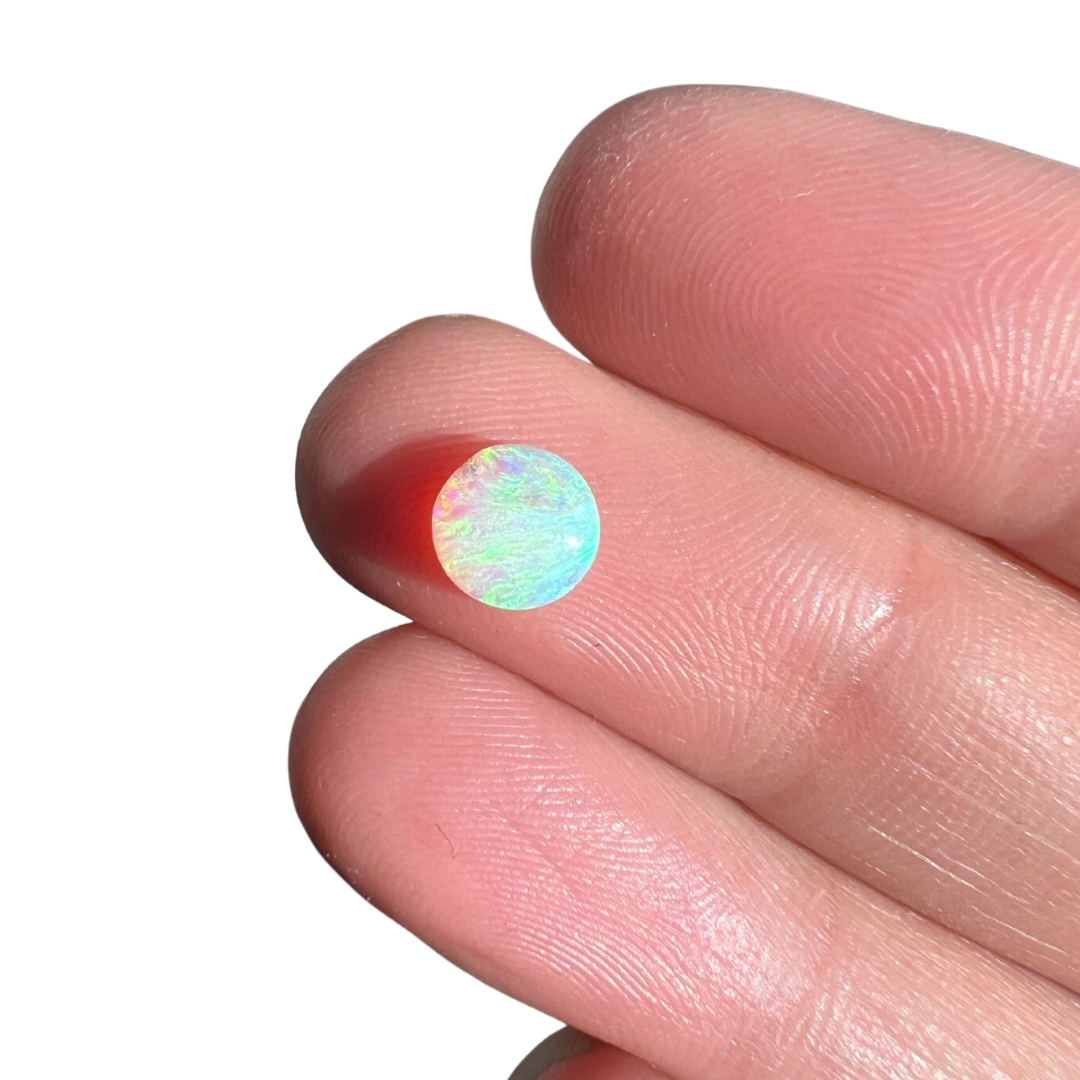 0.71 Ct round crystal opal