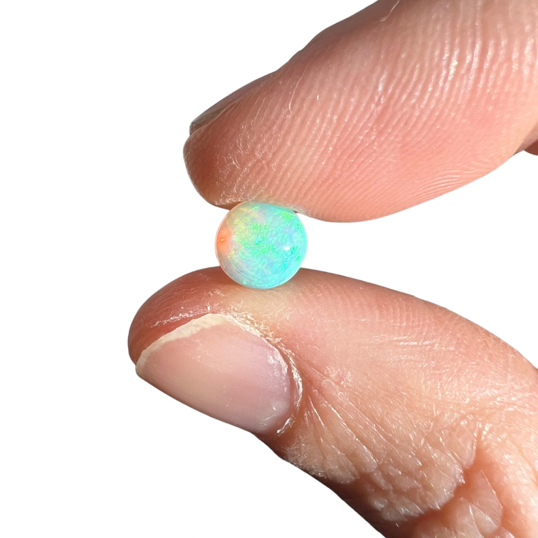 0.91 Ct round crystal opal