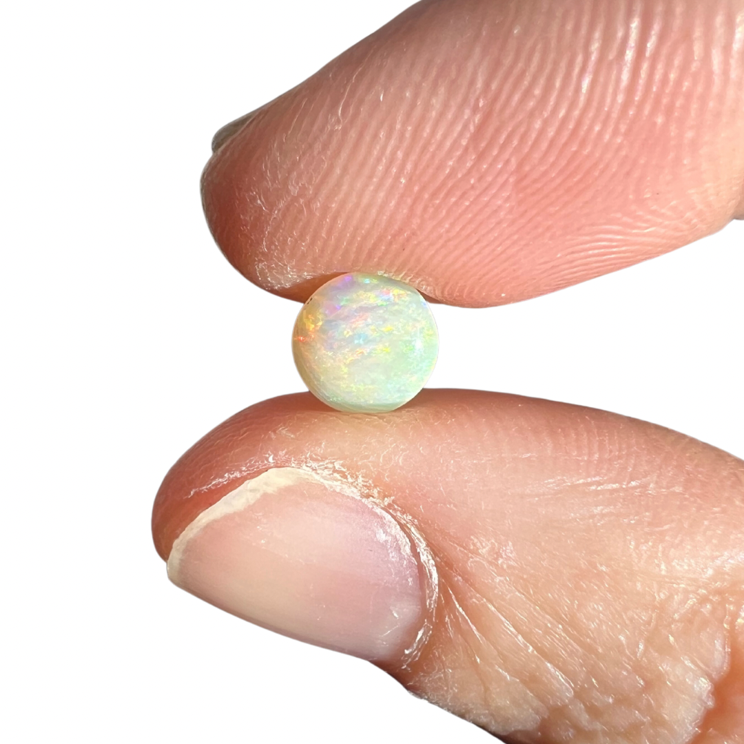 0.65 Ct round crystal opal