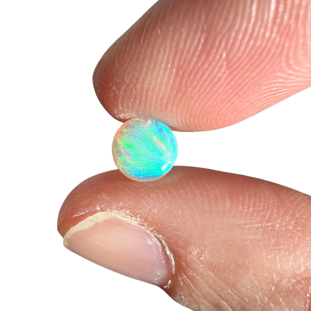 0.71 Ct round crystal opal