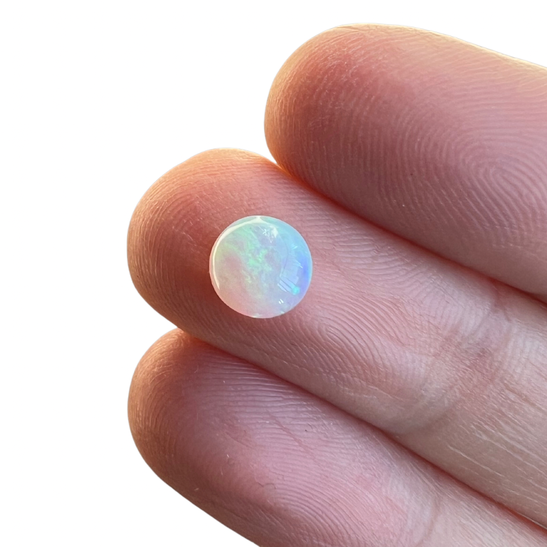 0.91 Ct round crystal opal