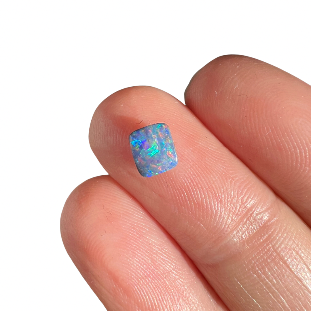 0.61 Ct rainbow boulder opal